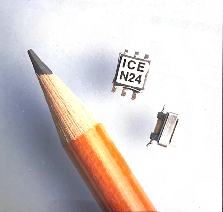 Miniaturisierte ICE-Bauteile neben einem Bleistift